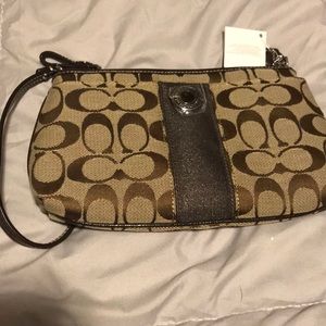 Coach clutch wristlet